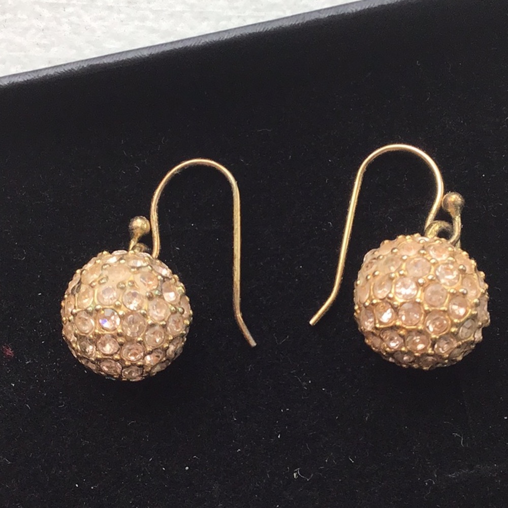 Gold earrings with white stones